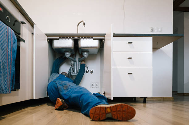 Professional Drain Cleaning technician working in Manchester, NH